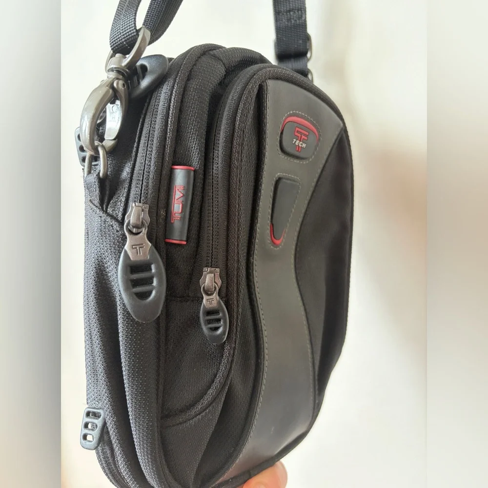 Tumi T-Tech sling bag with multiple compartments and Keychain mens